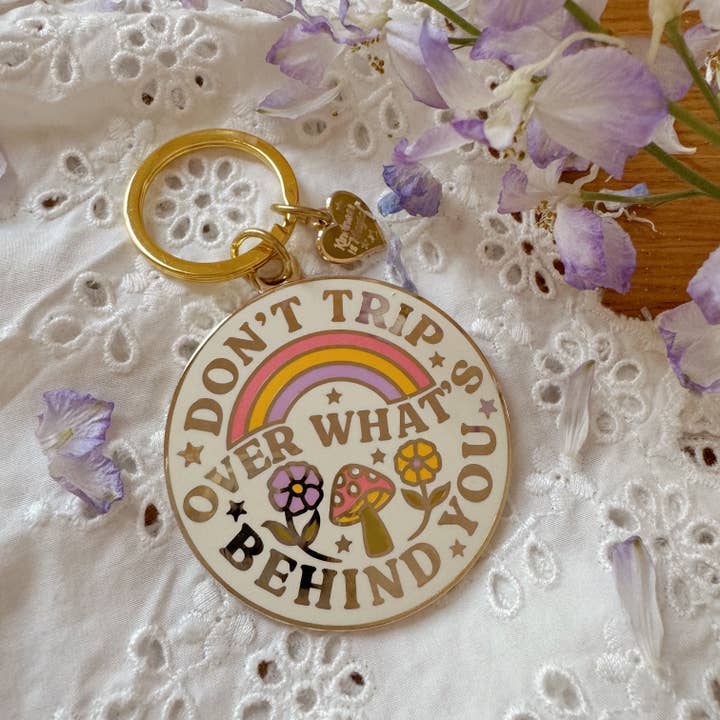 Porte-clés en émail Don't Trip Over What's Behind You pour la vente par Kindness is Magic