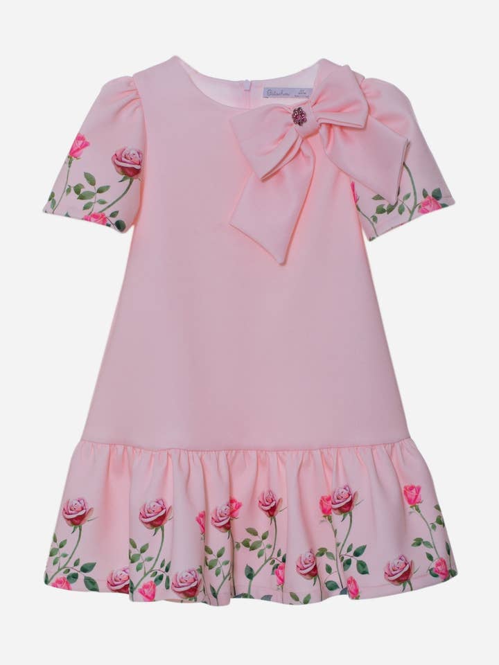 Vestito rosa da bambina con stampa di rose per la vendita all'ingrosso da parte di Patachou