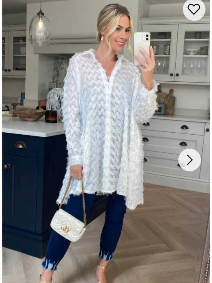 White Oversized shirt dress in multi tassel stripe for wholesale by CY FASHION. LONDON