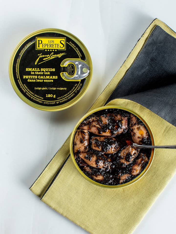 Los Peperetes Petits Calmars dans Leur Encre pour la vente par Tinmonger