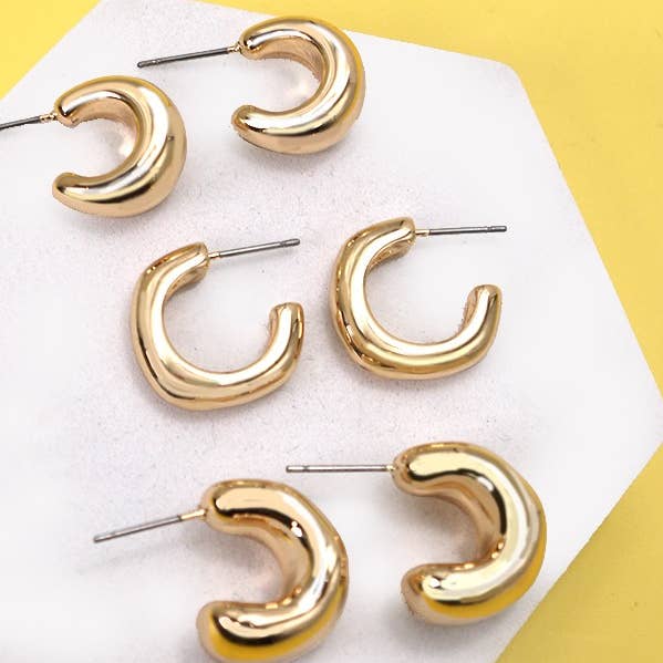 BUBBLY MINI HUGGIE HOOP TRIO EARRINGS | 80E2869 and other Purchase Wholesale ms004. Free Returns & Net 60 Terms on Faire trending on Faire.