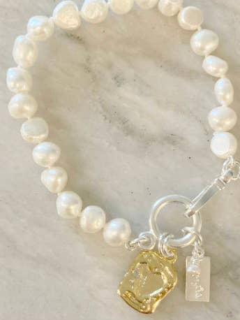 Pearl bracelet with gold artisan heart for wholesale by Pearly Girls, LLC