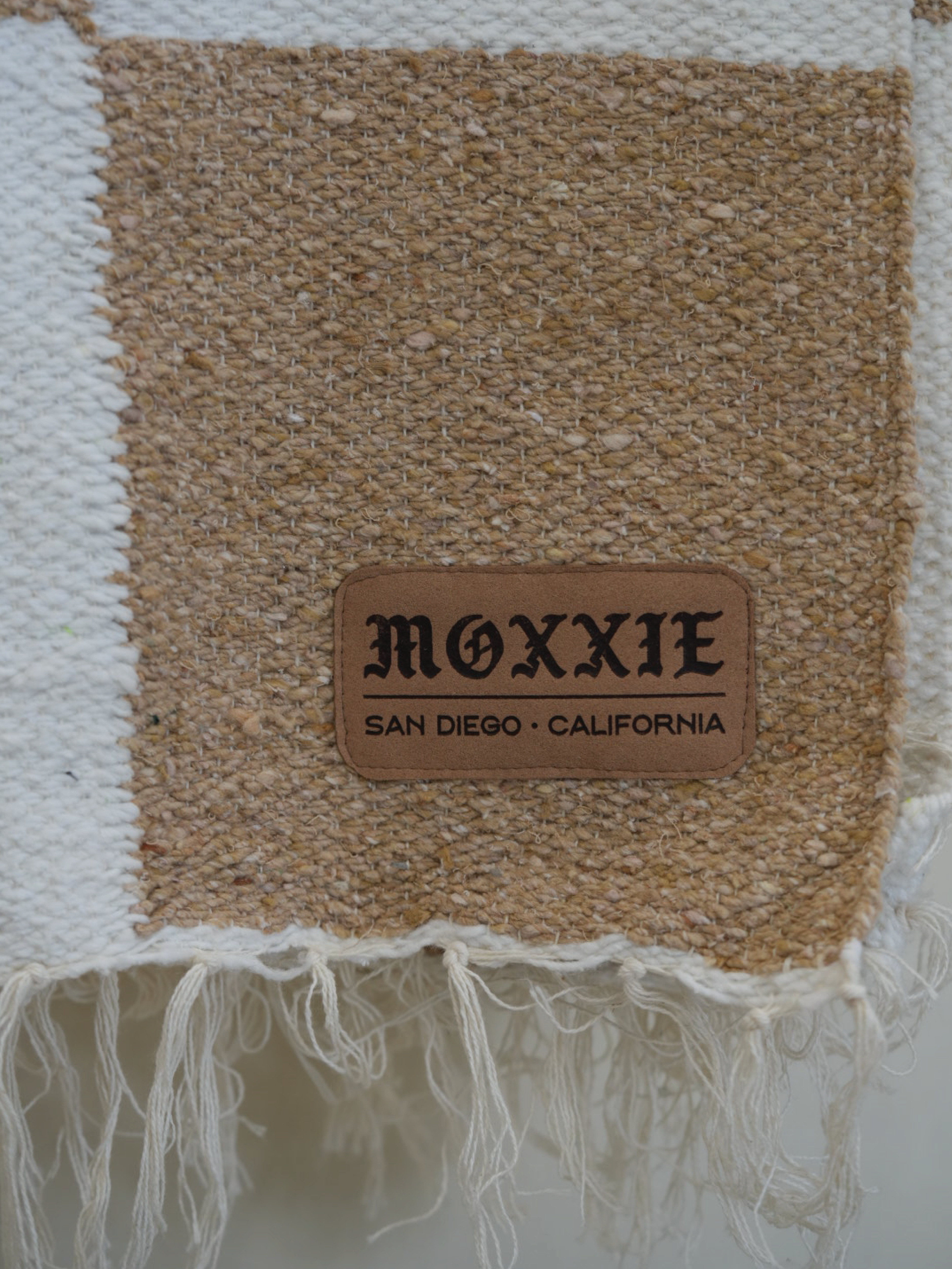 Natural Checkered Baja Blanket for wholesale on Faire5