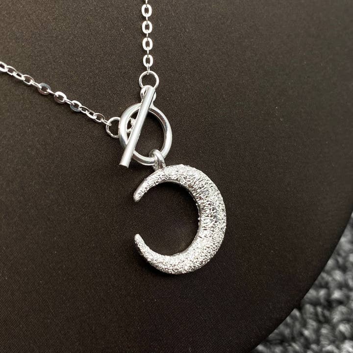 Mio Queena - Wholesale Pendant/Charm Necklace - S925 Sterling Silver Frosted Moon Charm Ot Buckle Necklace - MS