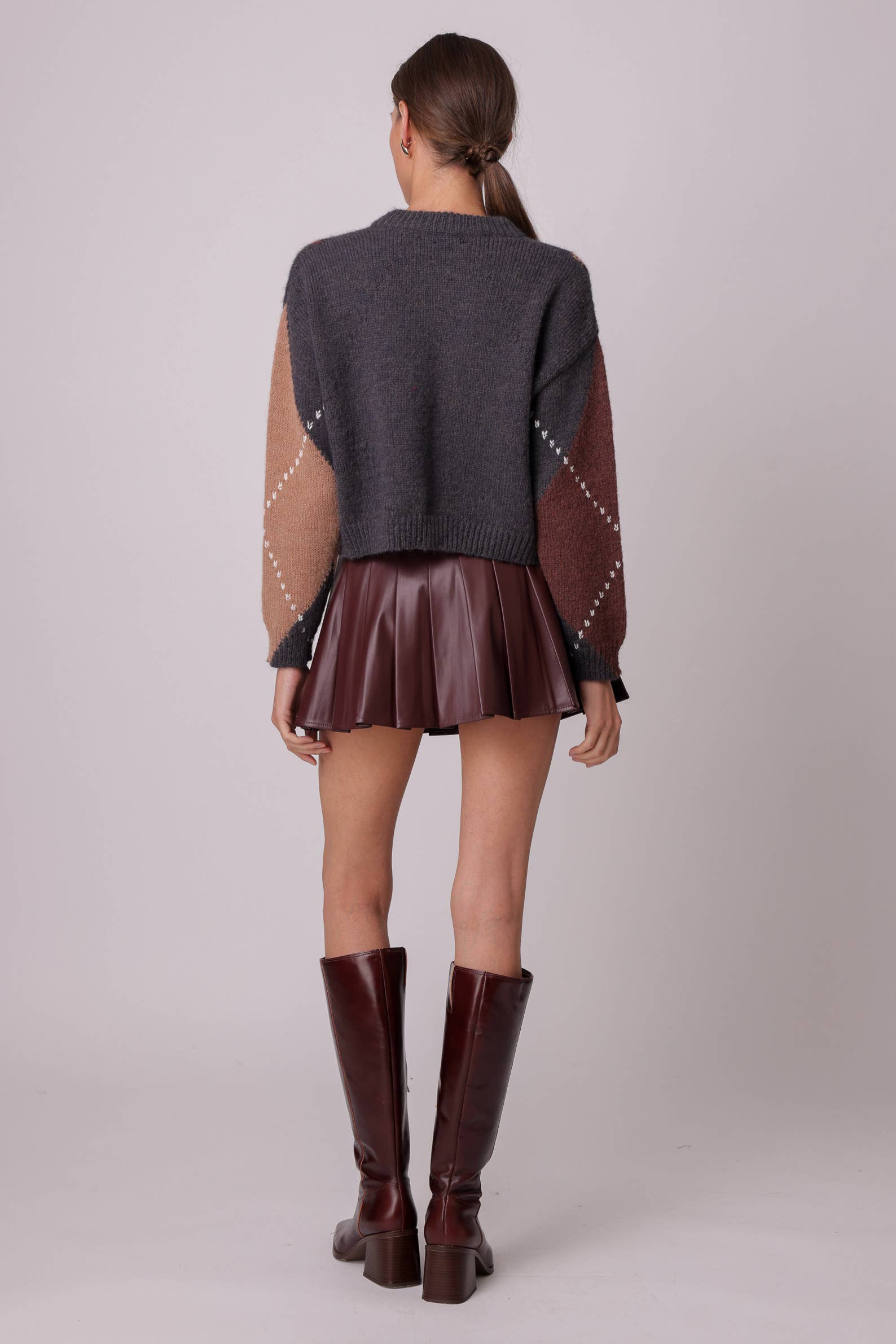 SANGRE DE BUEY FALDA PLISADA KEIKO de venta al por mayor en Faire5