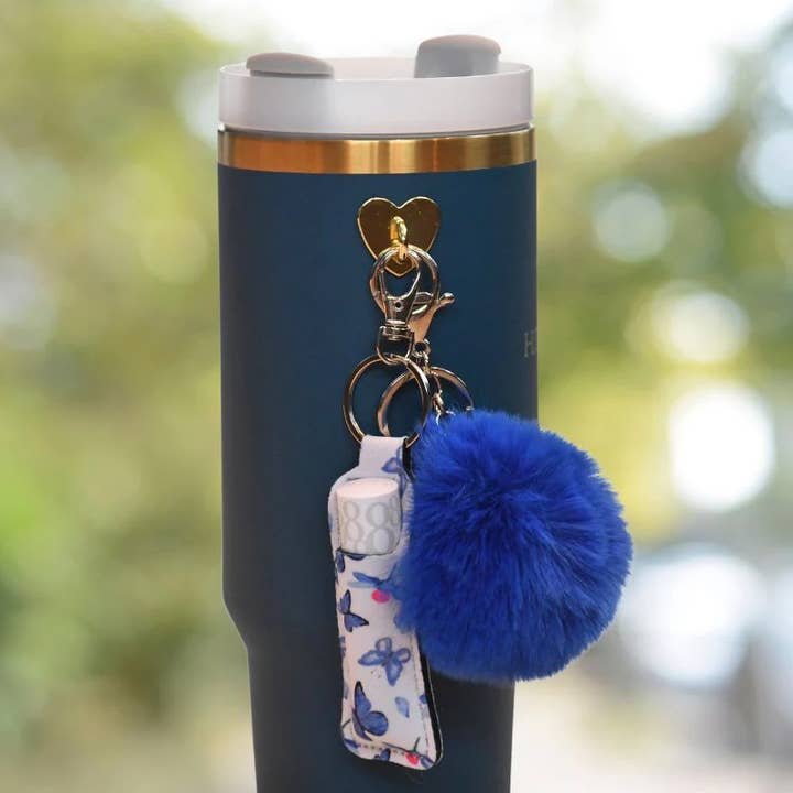 Boîtier bleu pour baume à lèvres avec motif papillon pour la vente par Hjertelig