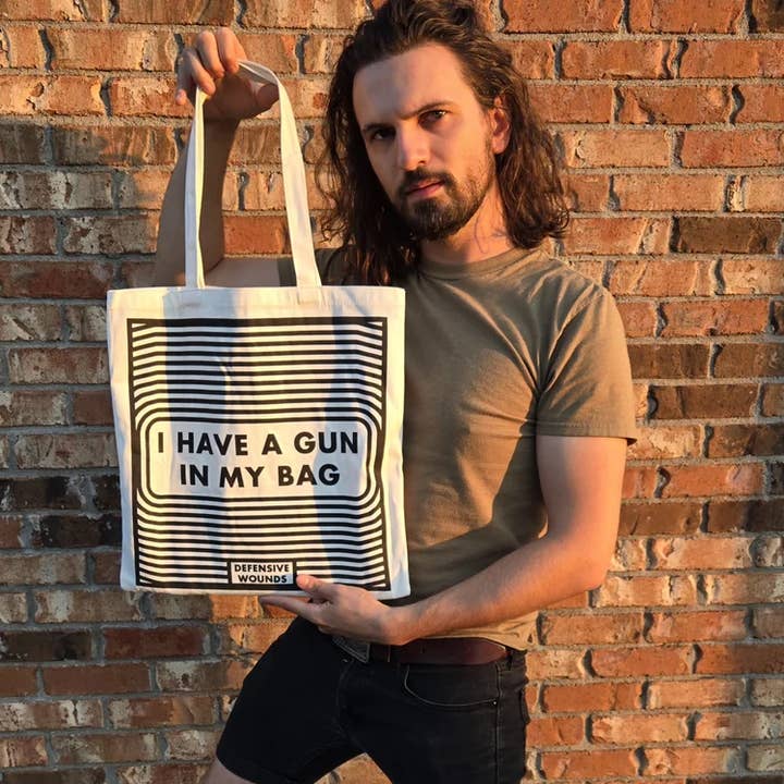 I HAVE A GUN IN MY BAG - Tote Bag for wholesale by Defensive Wounds
