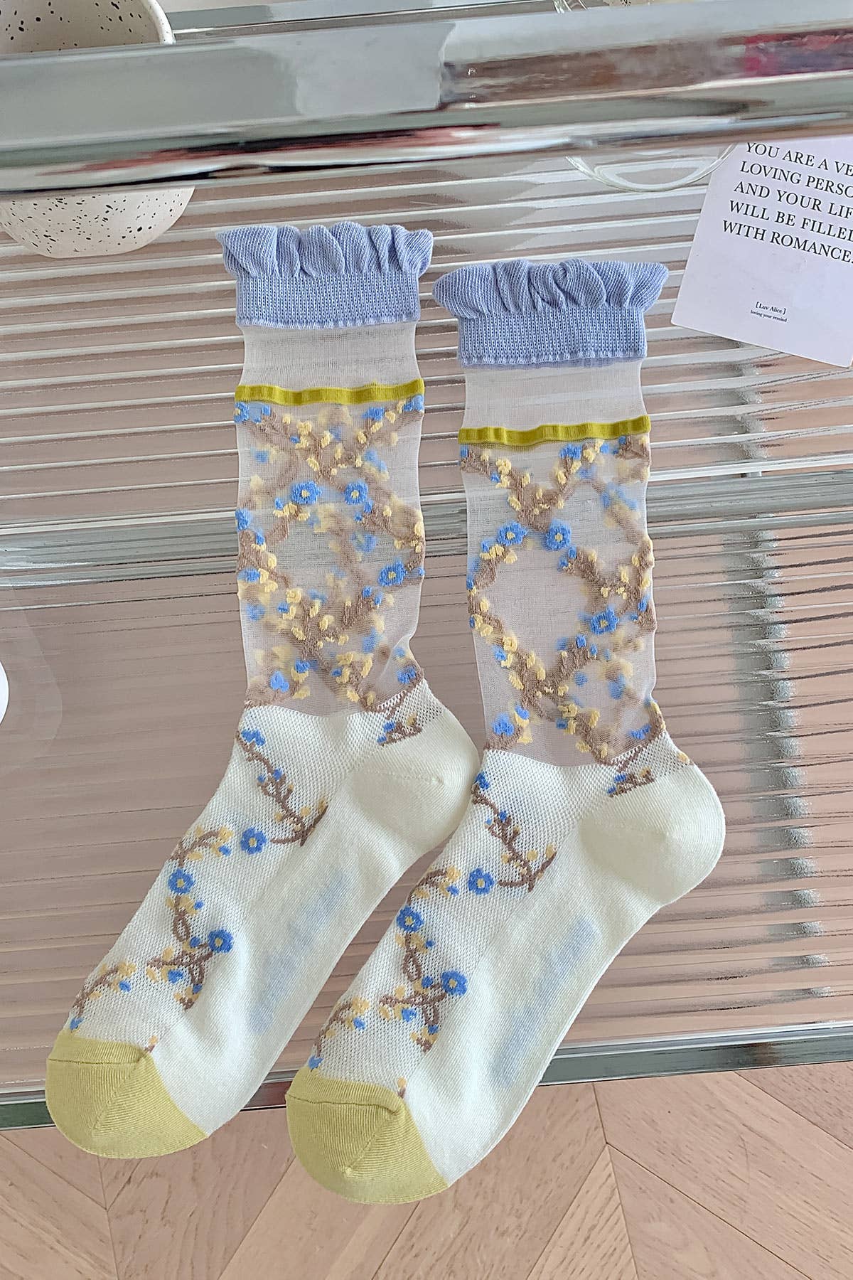 Sheer socks with blue flowers 💙🌼 for wholesale on Faire4