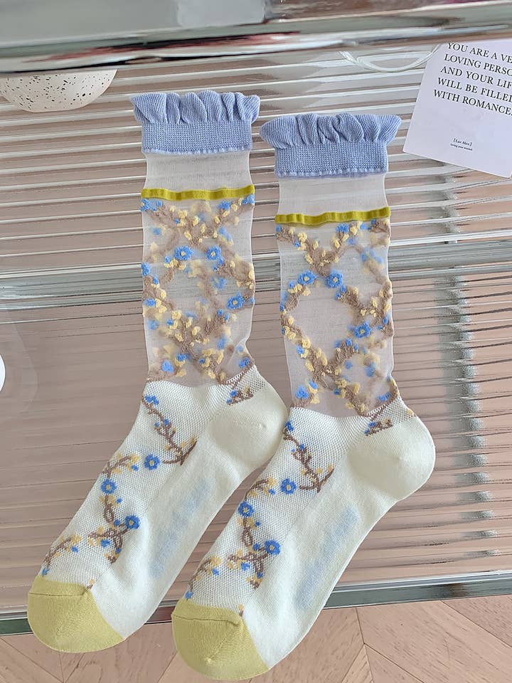 Sheer socks with blue flowers 💙🌼 for wholesale on Faire4