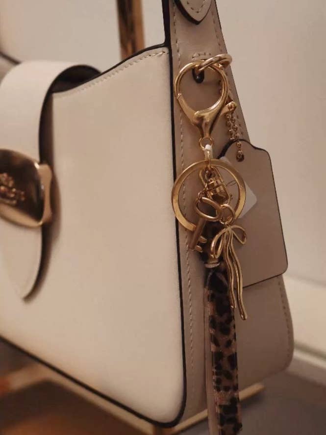 Cheetah Print Purse Charm for wholesale by November’s Eve Jewelry