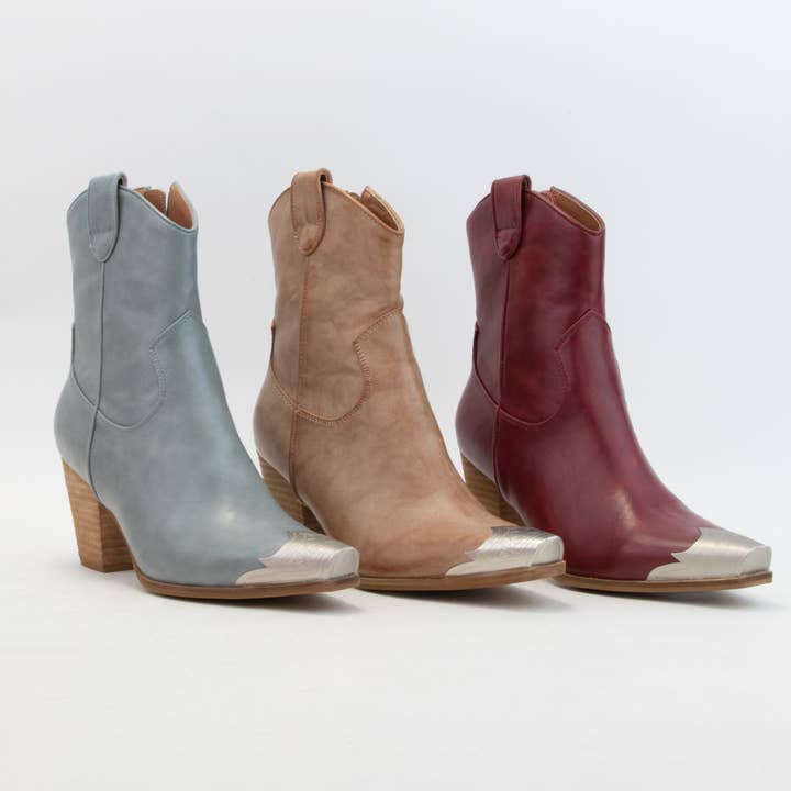 DAKOTA METALLIC TIP TOE COWBOY BOOTS and other Purchase Wholesale red dingo. Free Returns & Net 60 Terms on Faire trending on Faire.