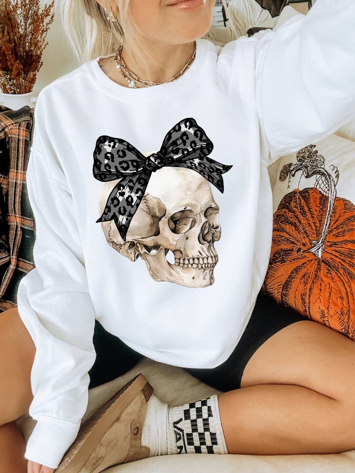 Coquette Bow Skull Spooky Adult Graphic Tee for wholesale by Uncommon Label