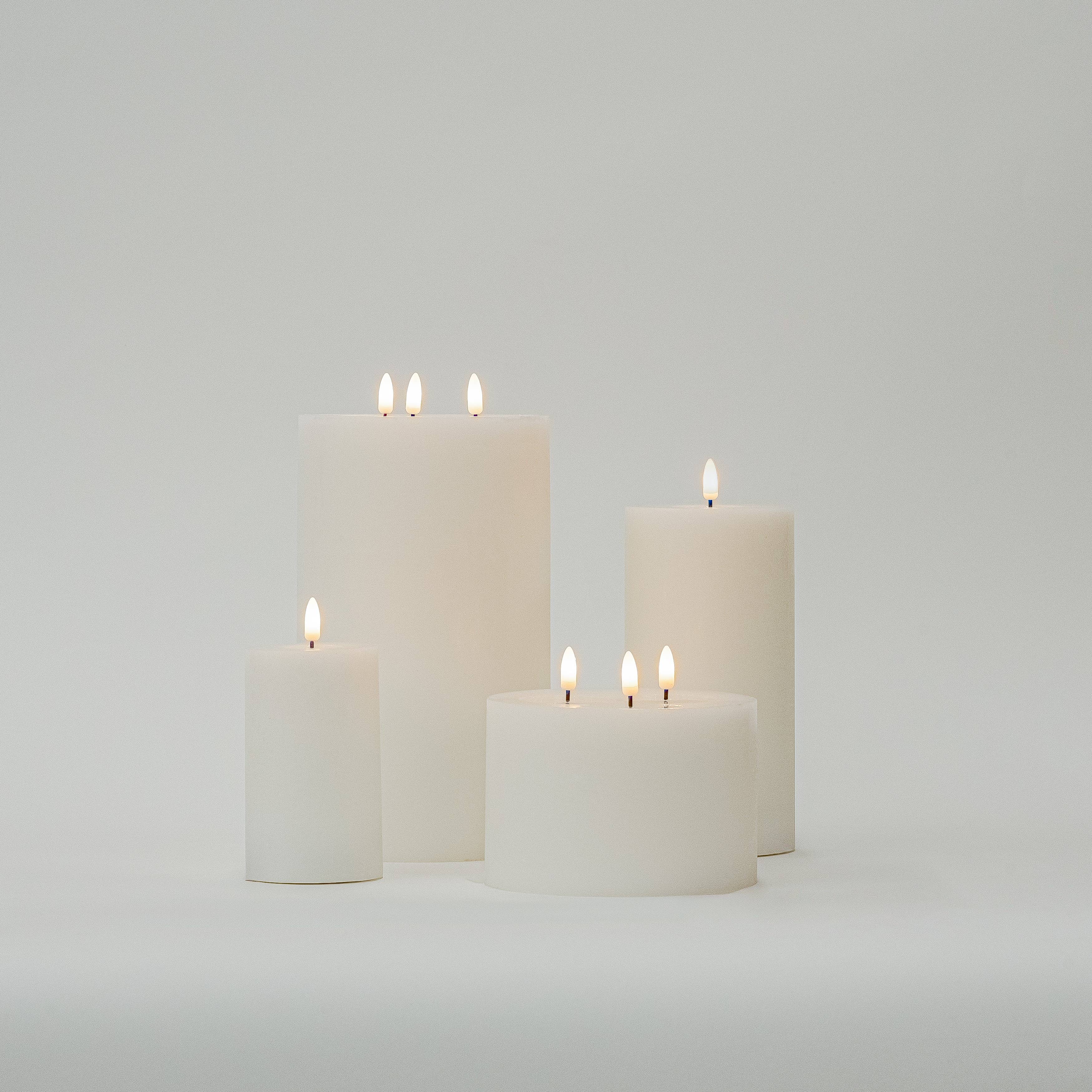 Small White Flameless Pillar Candle for wholesale on Faire1