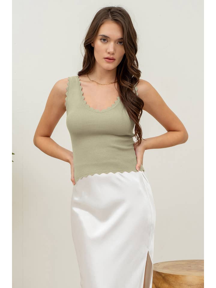 The Workshop Studio – wholesale Stickad topp - Dam – ÄRMLÖS TRÖJA MED KAMMUSSLINGSKANT STICKAD CROP TOP59