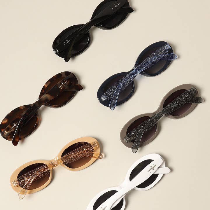 ASSORTED COLORS Women's Trendy Oval Glitter Sunglasses for wholesale on Faire1