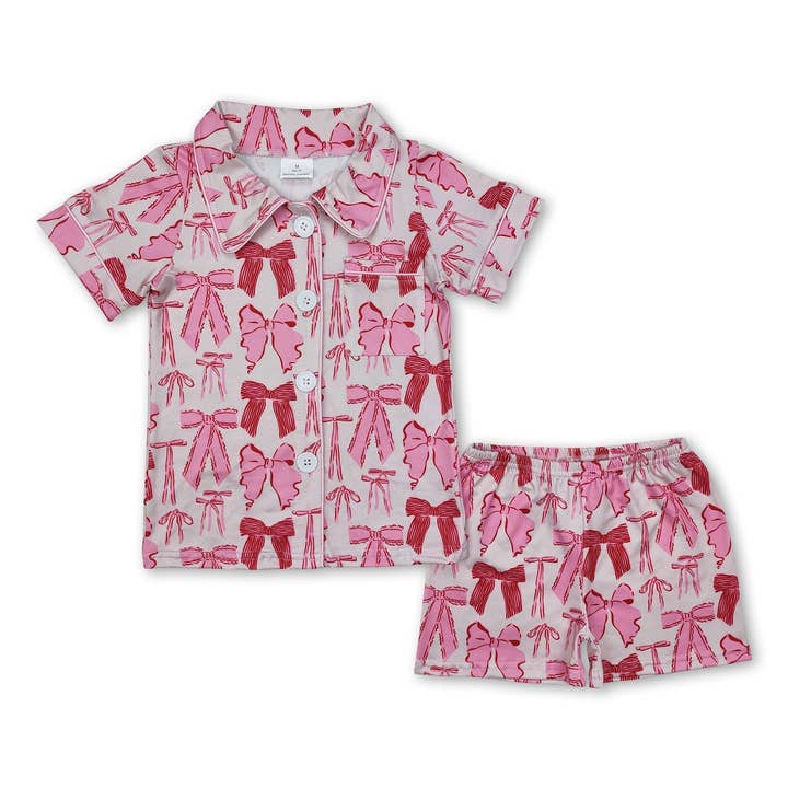 Short sleeves bow baby girls button down pajamas and other Purchase Wholesale pjs produce. Free Returns & Net 60 Terms on Faire trending on Faire.