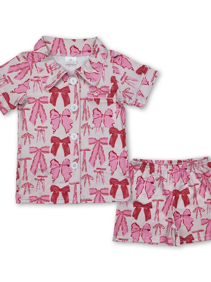 Short sleeves bow baby girls button down pajamas and other Purchase Wholesale bow pjs. Free Returns & Net 60 Terms on Faire trending on Faire.