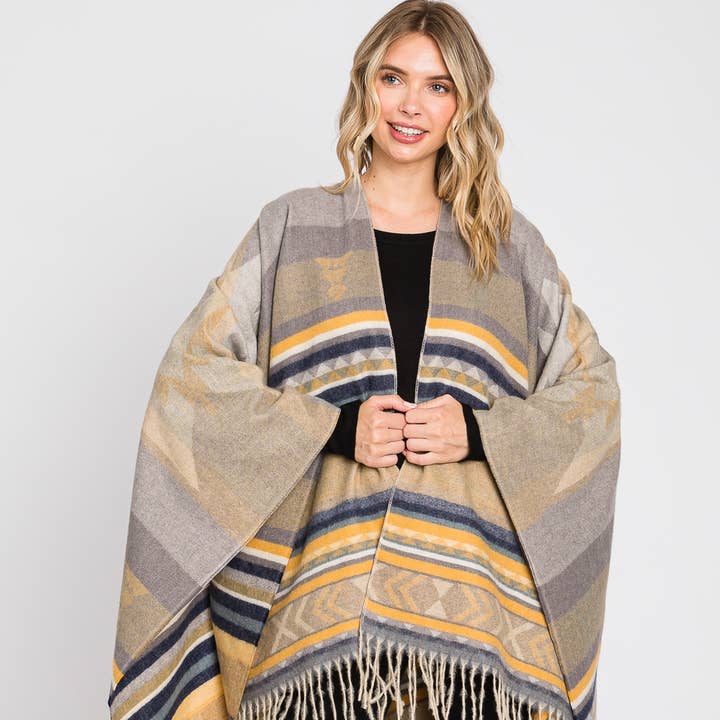 Aztec Pattern Fringe Ruana and other Purchase Wholesale collana. Free Returns & Net 60 Terms on Faire trending on Faire.