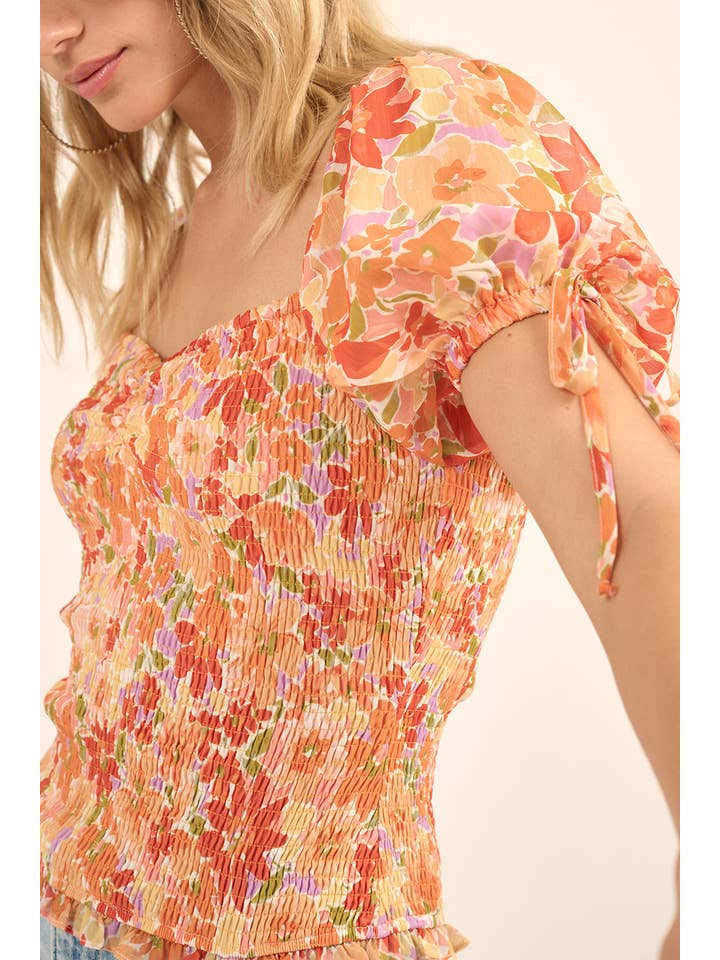 SUNBAKED Smocked Floral Ruffled Puff-Sleeve Peasant Top for wholesale on Faire