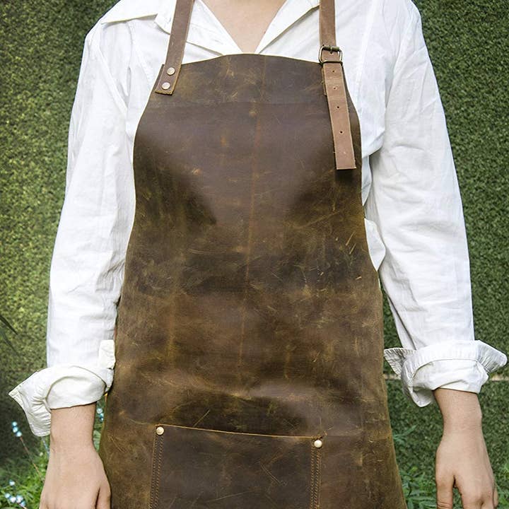 Tuzech Leather Tool Apron With Leather Pockets & Adjustable Straps For Carpenters, Chefs,Arts & Crafts, Waterproof & Durable and other Purchase Wholesale craft aprons. Free Returns & Net 60 Terms on Faire trending on Faire.