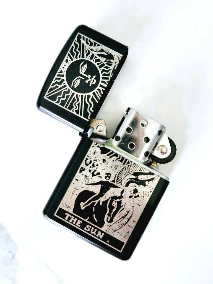 The Sun Tarot Engraved Flip Top Metal Windproof Lighter for wholesale by Three Witches Tea Shop