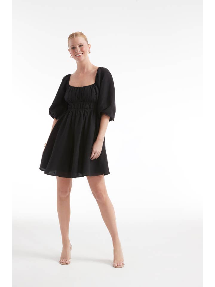 Black Lala Cinched Mini Dress - Leggy Hemline for wholesale on Faire