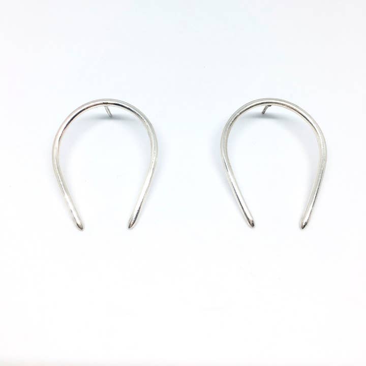 Goujon Arches pour la vente par NVMBR DCMBR