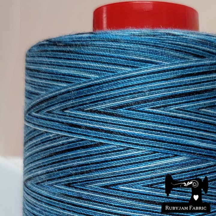 Twisted Threads - Teal Galaxy, 5000M spool, poly thread for wholesale by Rubyjam Fabric