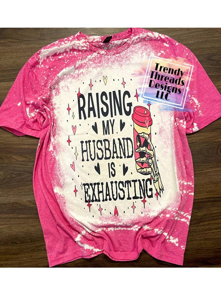 Trendy Threads Designs LLC - Wholesale Screen Printed T-Shirt - Women's - Raising my husband is exhausting shirt