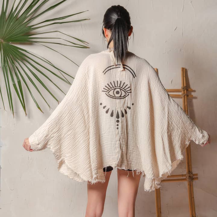 Peignoir kimono en mousseline Evil Eye, crème, poncho et autres tendances Résultats pour creme bohème en vente B2B. Retours gratuits et paiement à 60 jours sur Faire sur Faire.