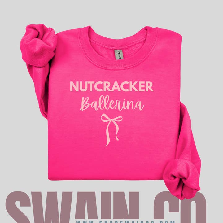 Nutcracker Ballerina Sweatshirt with Embroidered Bow | Pink Christmas Crewneck | Holiday Ballet Gift | Personalization Optional for wholesale by Swain Co.