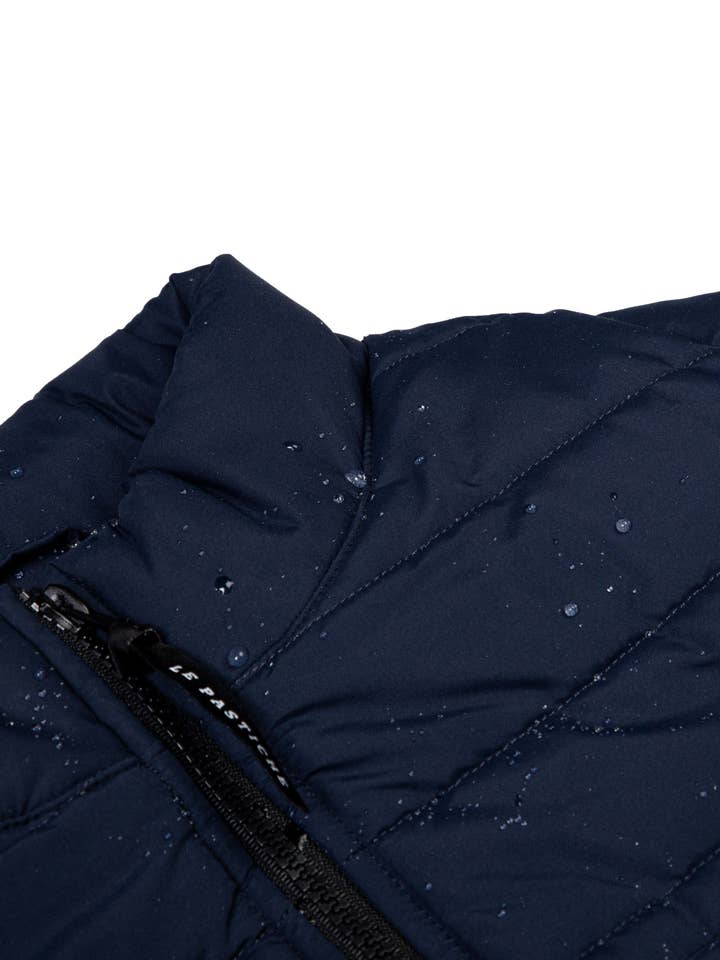 Gilet bleu marine toutes saisons pour la vente par Le Pastiche