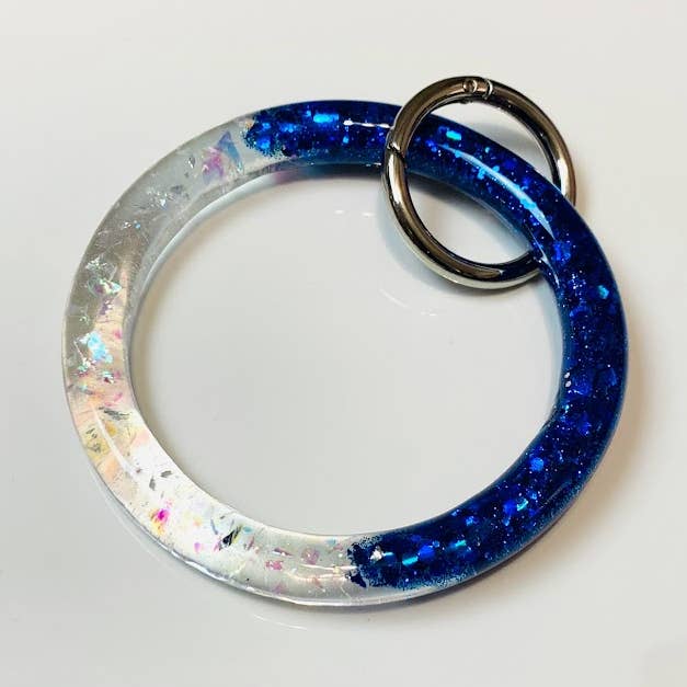 Mousserende blå & klar nøglering armbånd armbånd sæt for engroshandel hos Shop Drip Express