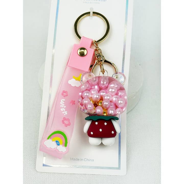 PINK Floating Pearl and Glitter Kitty Key Chain for wholesale on Faire3