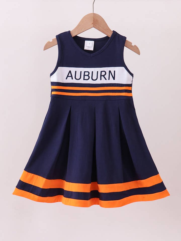 Premium Navy Auburn embroidery ruffle dress for wholesale by Aspen Rain Boutique