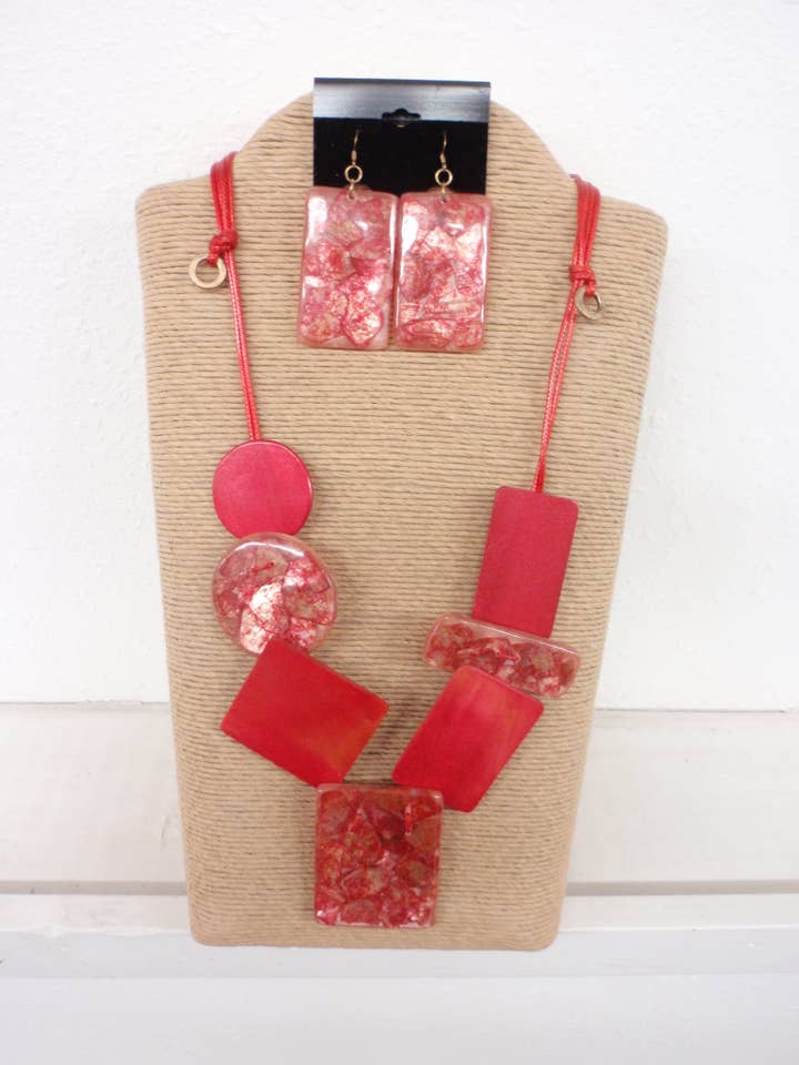 ADJUSTABLE RED WAX CORD WITH ASSTD SHAPES WOOD AND RESIN NEC for wholesale by International Duru's