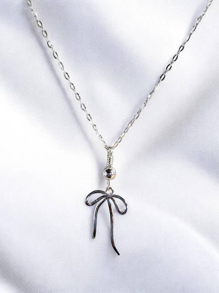 Dainty Bow Necklace for wholesale by North Fork Jewelry Design, LLC