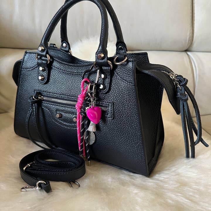 NEO - classic Genuine leather and other Purchase wholesale neo handbags. Free returns & net 60 terms on Faire trending on Faire.