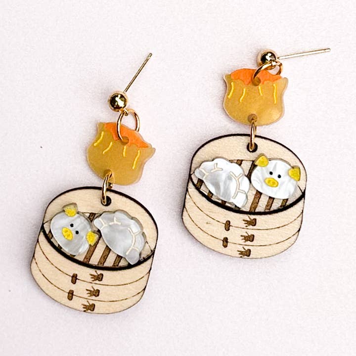 Dimsum Earrings and other Purchase Wholesale gold chocolate hearts. Free Returns & Net 60 Terms on Faire trending on Faire.