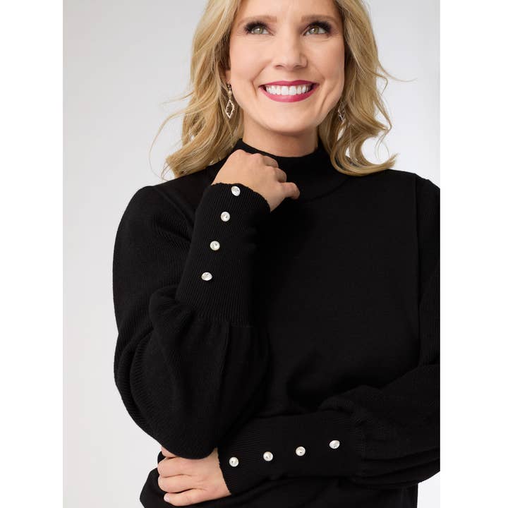 Black Skylah Mock Neck Sweater with Pearl Button Cuff for wholesale on Faire2