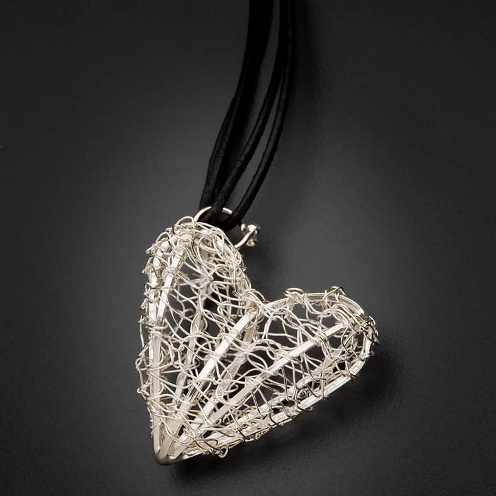 Crocheted Silver Heart Pendant for wholesale by Uncommon Threads Studio