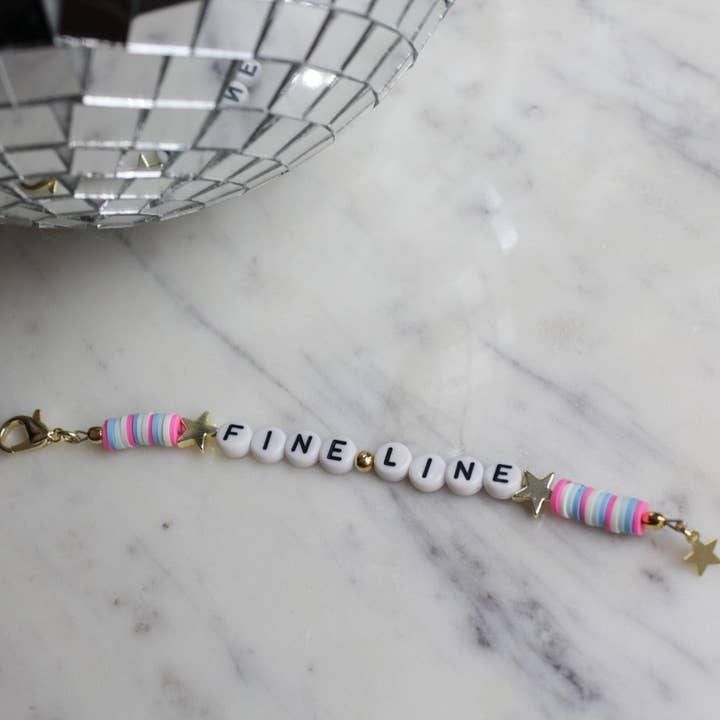 Fine Line Keychain for wholesale by White Daisy Jewelry LLC