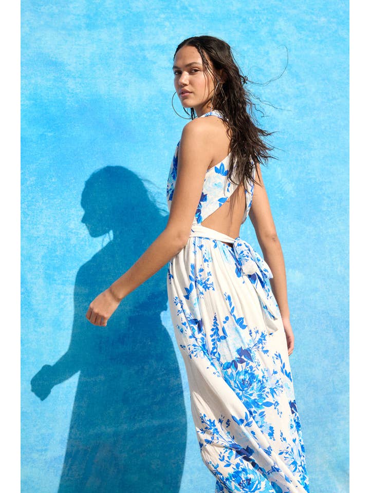 Off White Blue Plunging Neck Floral Woven Jumpsuit for wholesale on Faire2