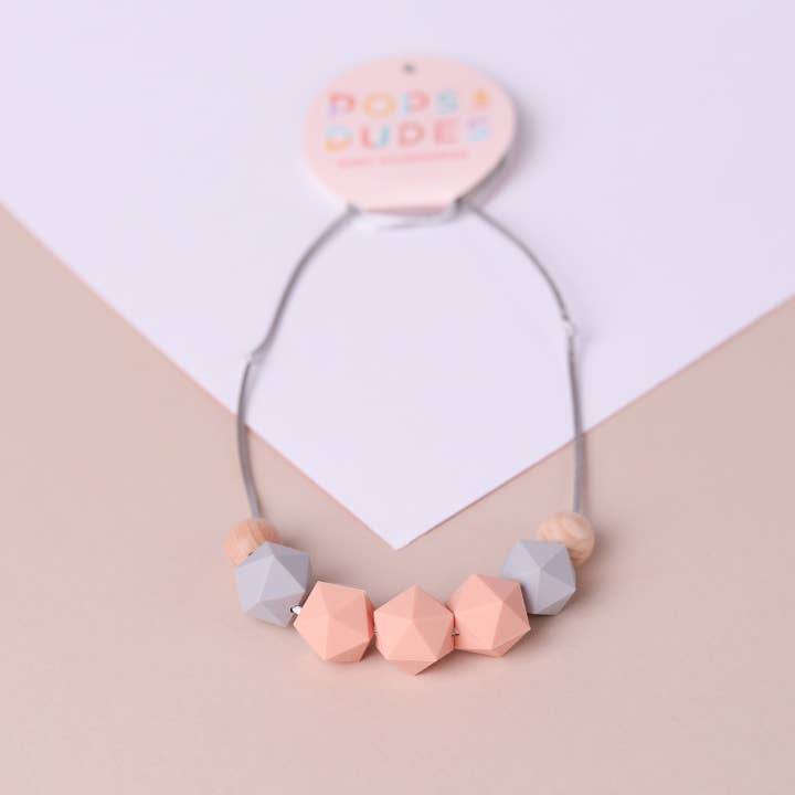 Peachy grey teething necklace for wholesale by Pops and Dudes