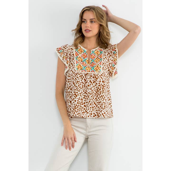CREAM Flutter Sleeve Dotted Top for wholesale on Faire7