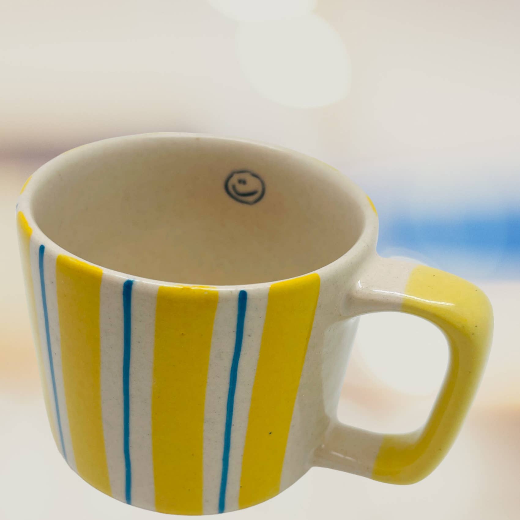 NOÏ Hamburg – Großhandel Kaffeebecher – Tasse S stripe yellow1