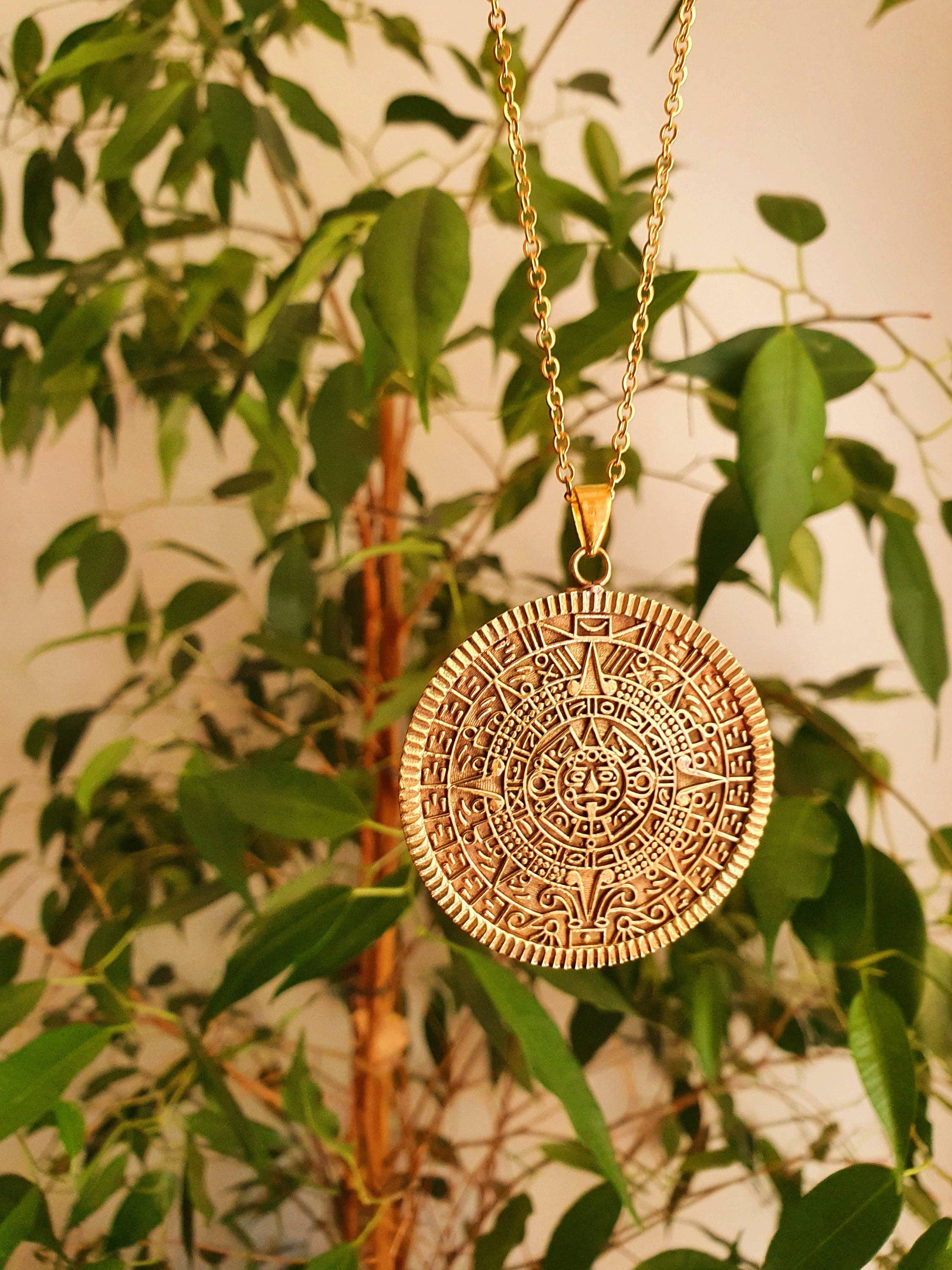 Kaali Boutique – wholesale Pendant/charm necklace – Gold Sacred Mayan Calendar Necklace / Hypoallergenic / Brass / Boho / Aztec / Inca / Ethnic / Hypoallergenic / Third Eye / Illuminati5