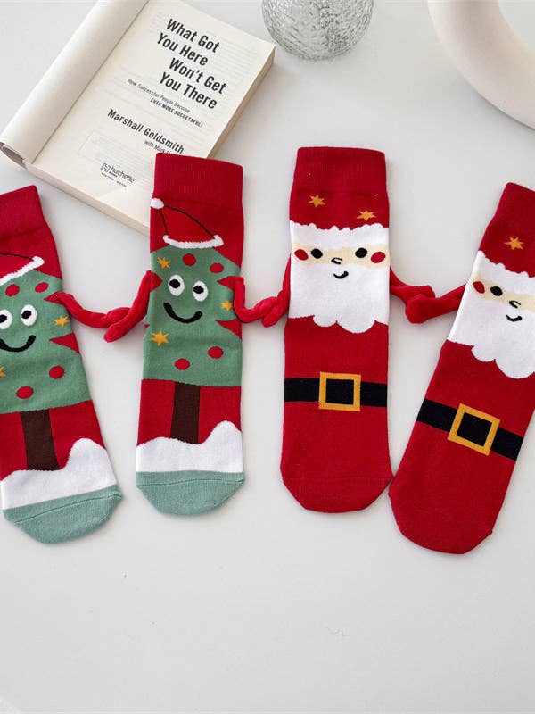 Chaussette de Noël aimantée avec maintien des mains pour la vente par VividLux