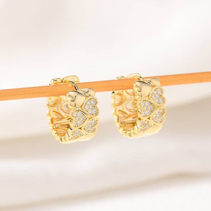 Boucles d'oreilles Eros dorées pour la vente par peachade