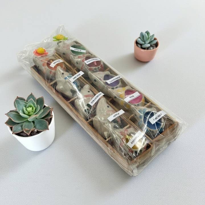 Mini Ceramic Elephant Candles (10-Pack) for wholesale by Earths Elements Wholesale